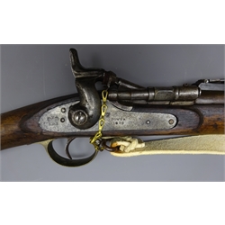  Victorian British Percussion breech loading three-band Snider type Carbine, 90cm barrel with ladder sight, plain action marked 'Tower' dated 1870 with Crown, brass trigger guard and steel ramrod, L140cm with steel socket bayonet and white leather sling  