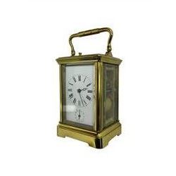 Late 19th century French carriage clock with a lever platform escapement, striking and alarm train and repeat button, in a gilt brass corniche case with an enamel dial, Roman numerals, minute track, steel moon hands and subsidiary alarm dial, eight-day movement striking the hours/half hours and alarm on two coiled gongs, movement backplate stamped G.L, trademark for Gay & Lamaille & Co, French clockmakers and wholesalers, c1880. 