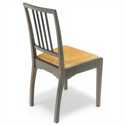 Acornman - set of four dark stained oak dining chairs, with four vertical slats, drop-in tan leather seat, supported on square tapering legs with carved acorn signature, by the workshop of Alan Grainger of Brandsby