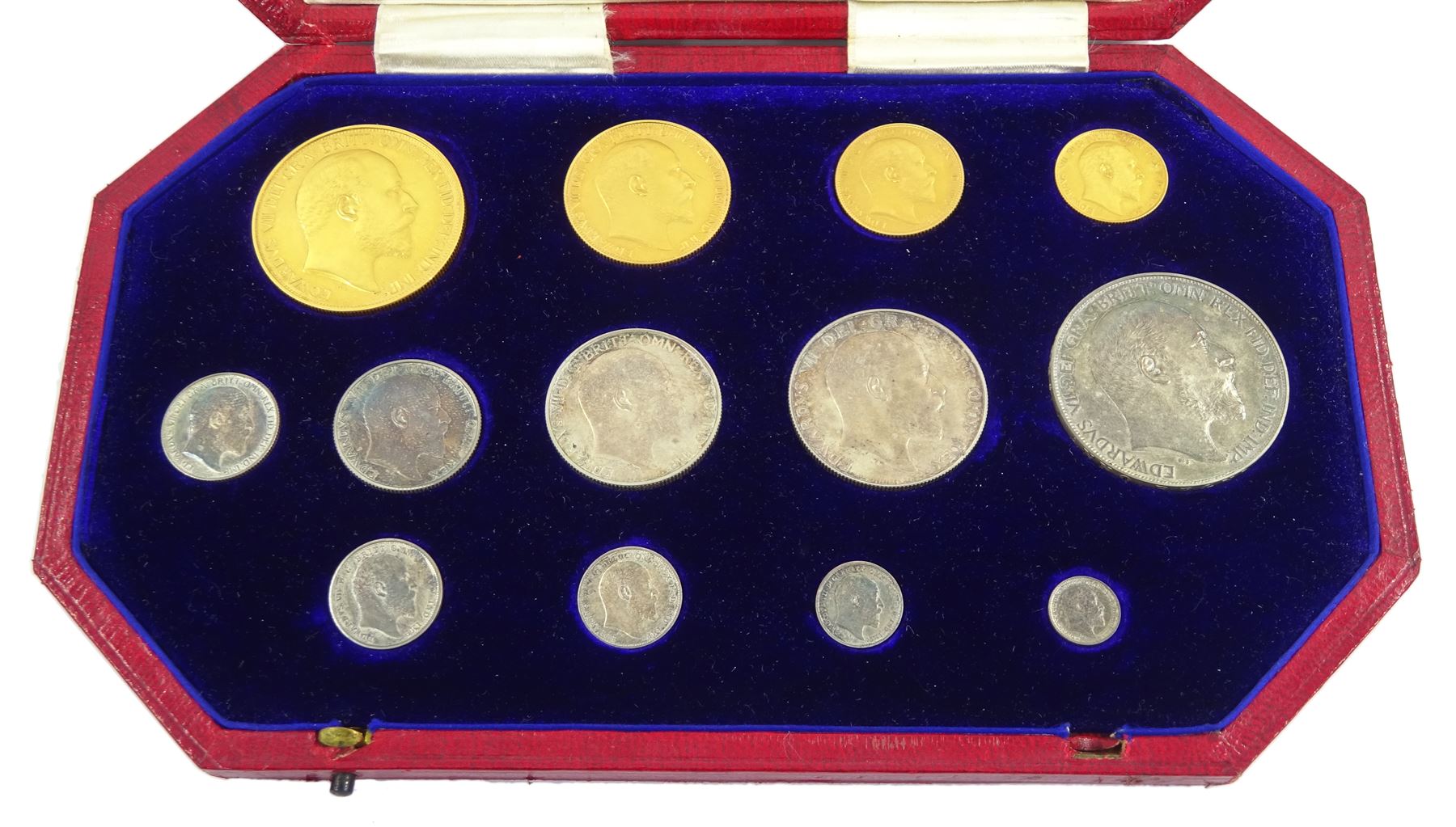 King Edward VII 1902 matt proof long coin set, comprising gold half sovereign, sovereign, two pounds and five pounds, silver maundy money set, sixpence, shilling, florin, halfcrown and crown, housed in the official dated case of issue