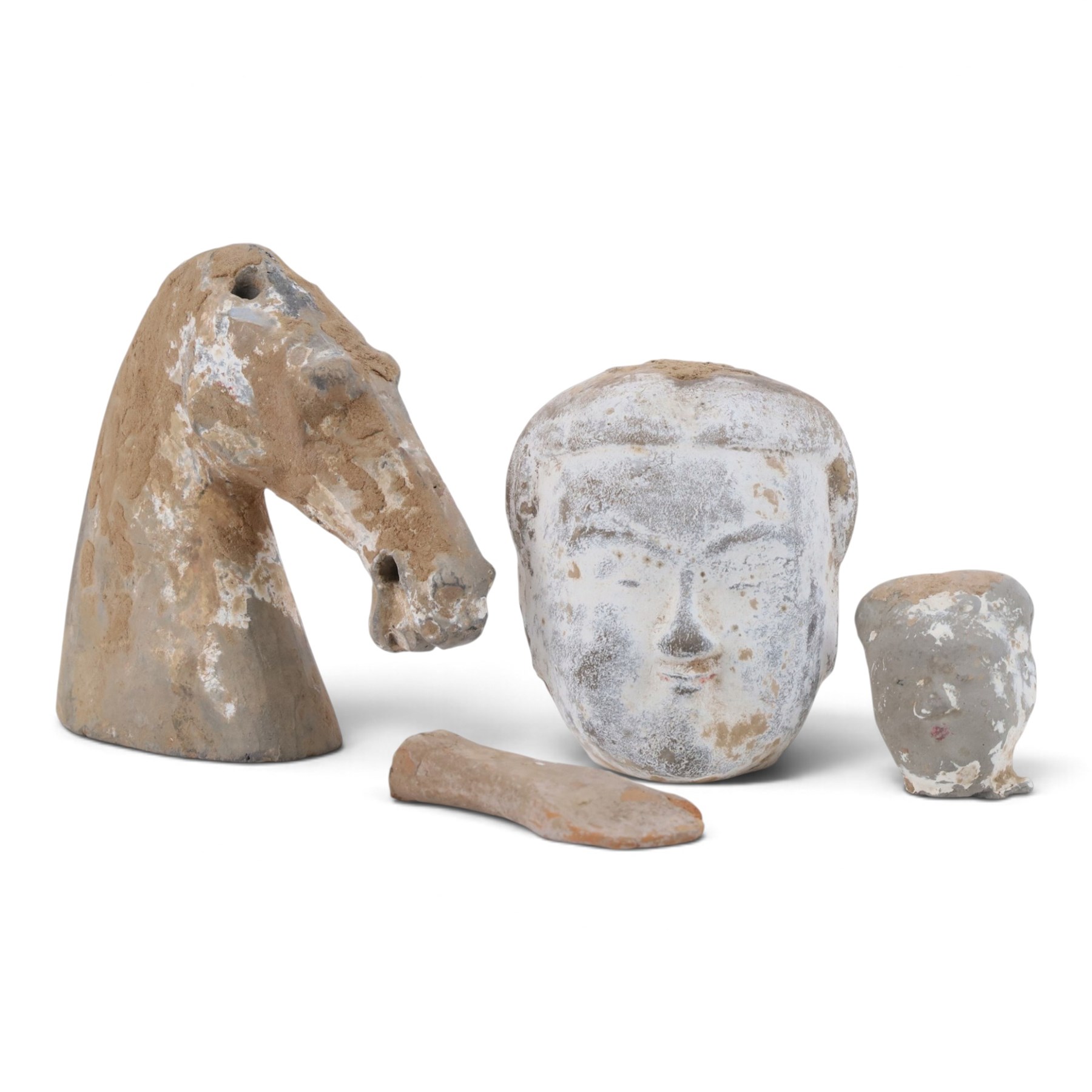 Group of early Chinese pottery items, probably Han Dynasty,, two dignitary heads and horses head, horse H17cm