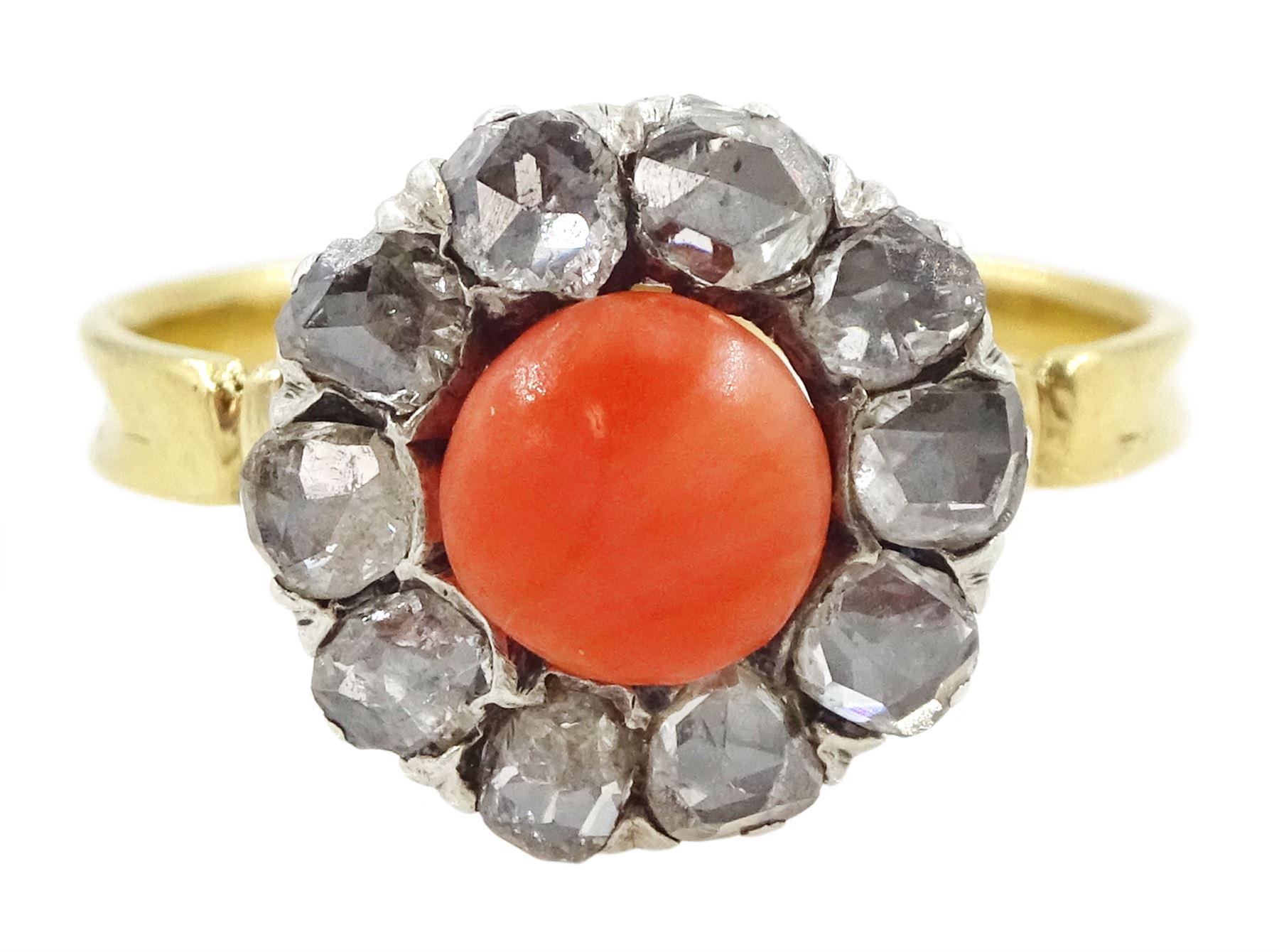 Early 20th century 18ct gold and silver coral and diamond cluster ring, single  cabochon cut coral, surrounded by ten rose cut diamond stones 