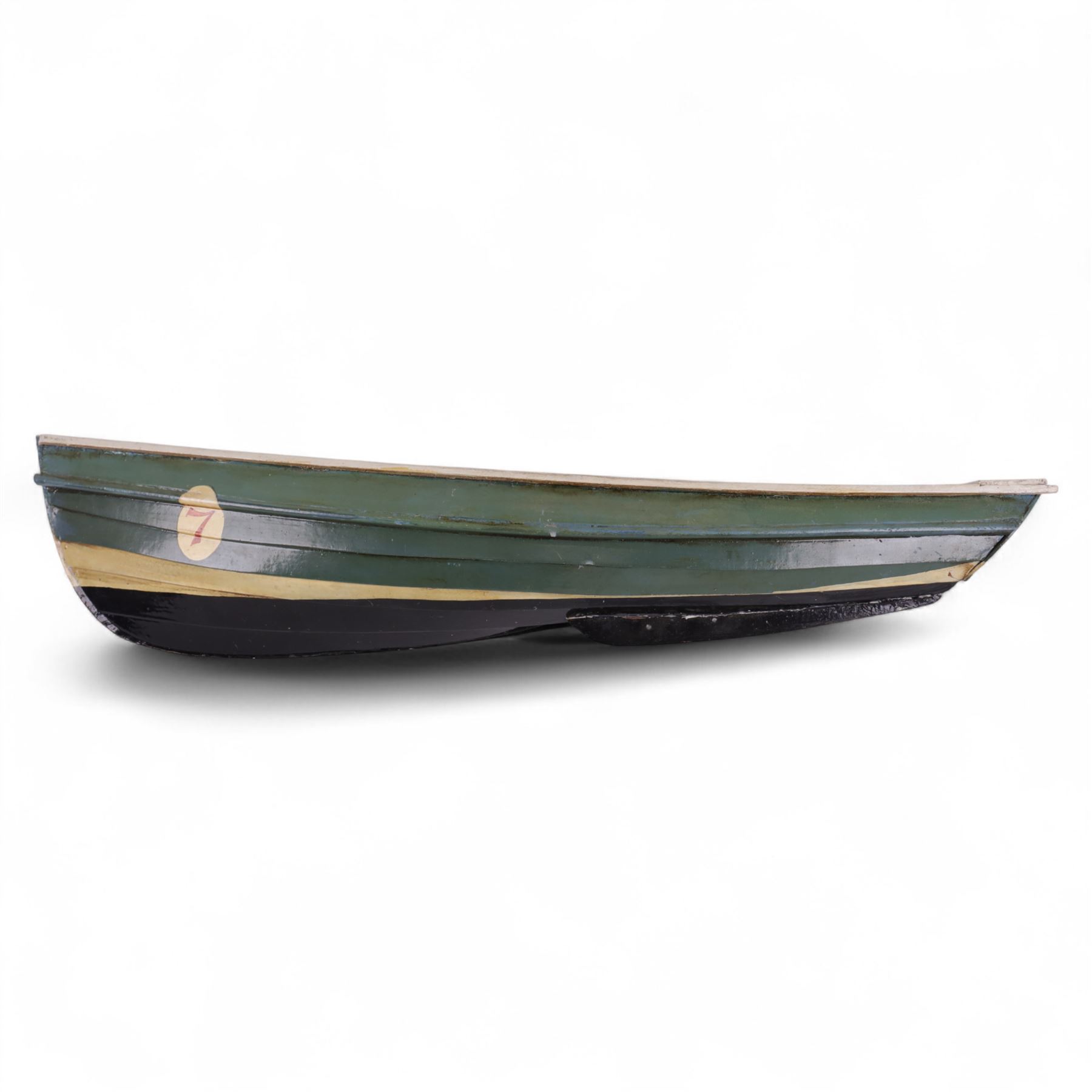 Two wooden fishing coble models, comprising SE31, with rudder, painted in blue, white and red and SSS.33 'Alice', painted in green, black and yellow, largest H16cm, L70cm