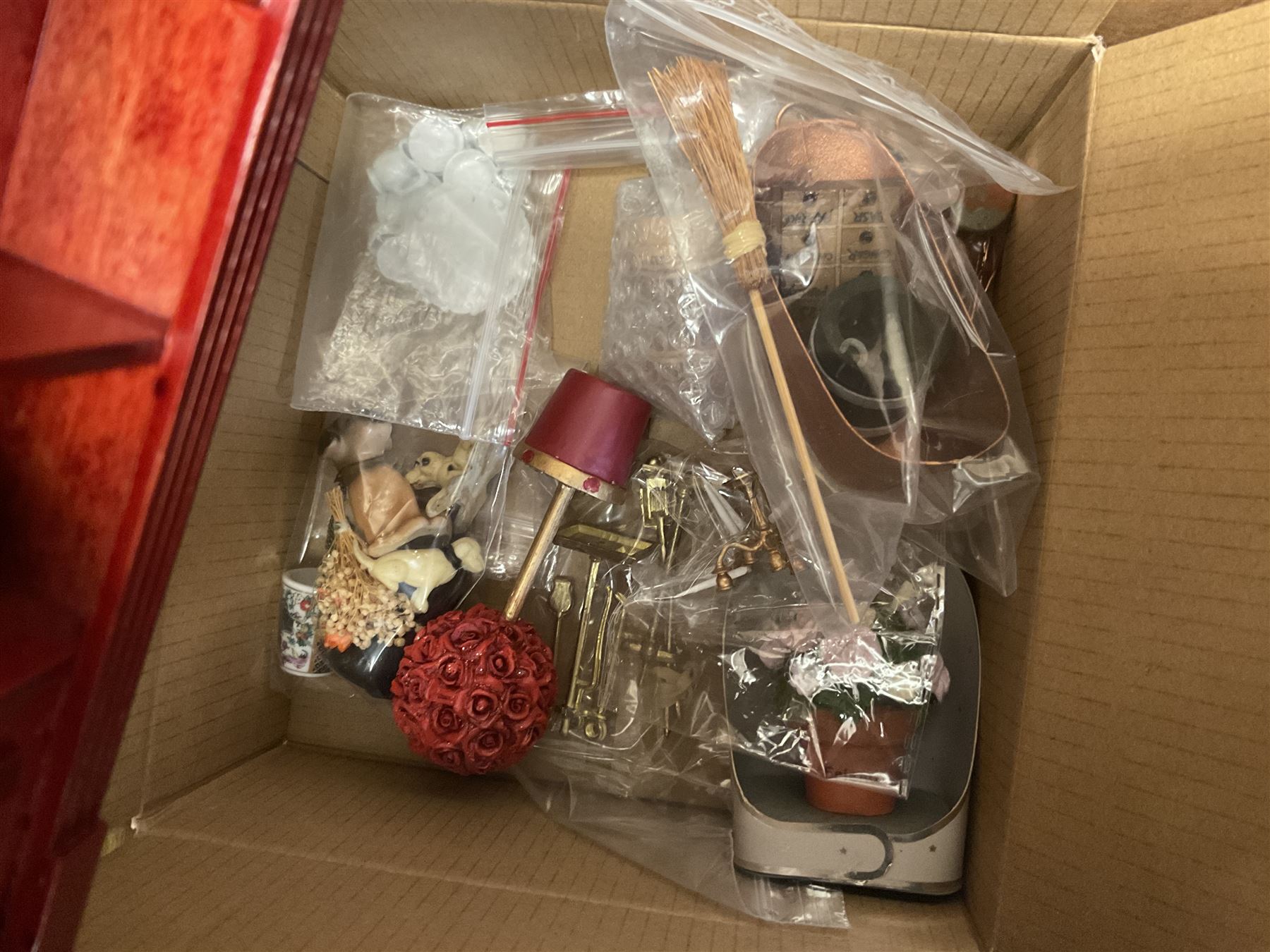 'The Hollies' - good quality sectional wooden doll's house in the form of a Georgian style four-storey bay windowed town house with simulated brick front elevation, rendered sides, off-set corner stonework, faux slate-hung top floor with flat roof and chimney stack, working sash windows, iron railings around front basement courtyard with hinged front elevation to two rooms with  spiral staircase, side hinged central section approached by external steps with iron balustrades to the sides leading to a front door, entrance hall with stairs to landing and two rooms on two floors with dado panelling and fire-surrounds, the top floor with top hung front elevation revealing stairs to a landing and bedroom; wired for electricity L51cm D65cm H107cm including chimney; together with a good quantity of quality wooden furniture and accessories including piano, dressers, bookcase and books, rugs, double half-tester bed, metalware, pictures etc