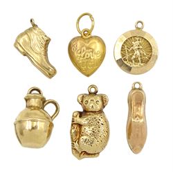 Six 9ct gold charms including koala, shoe, boot, 'I Love You' heart, St Christopher's and jug, all hallmarked 