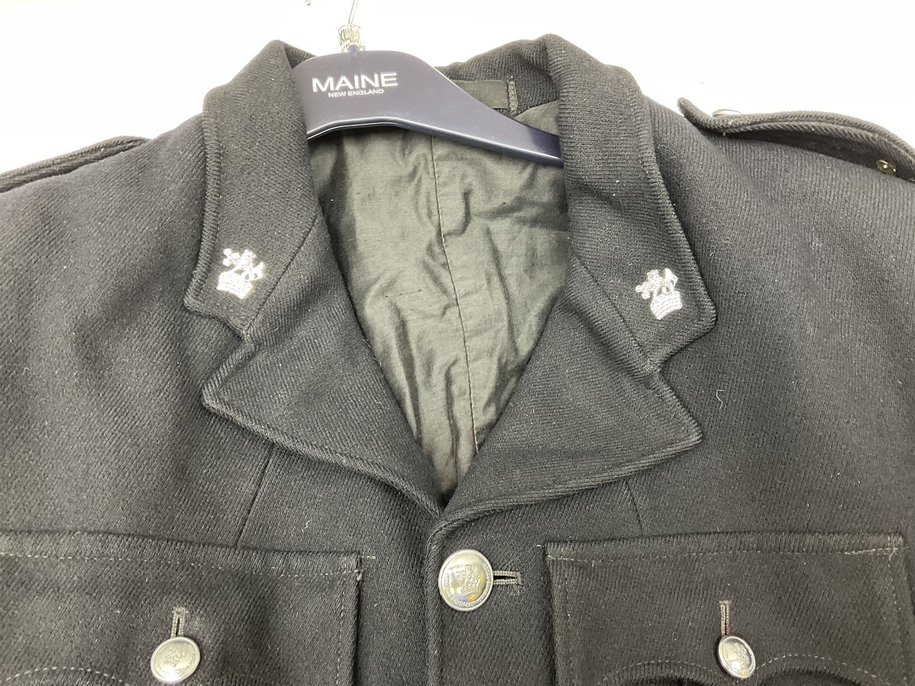 LNER Police cape; indistinctly dated 1943(?); York & North East Yorkshire Police belted tunic; belted tunic with Chief Constable epaulettes and buttons; and another tunic with staybrite Queens Crown buttons (4)