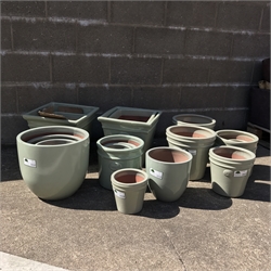  Six graduating square tapering glazed ceramic planters, five egg pots, five traditional pots and four tapering pots (20)  