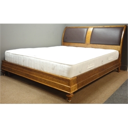  Quality reproduction walnut 6' SuperKing bedstead with padded leather headboard on turned feet, with 'SimplyBeds' mattress, W190cm, H117cm, D233cm  