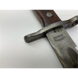 Swiss Schmidt-Rubin M1914 pioneer bayonet, with 48cm steel saw-back blade, the ricasso stamped, ''Waffenfabrik, Neuhausen'', the crosspiece stamped Swiss cross, steel scabbard, leather frog L64cm overall