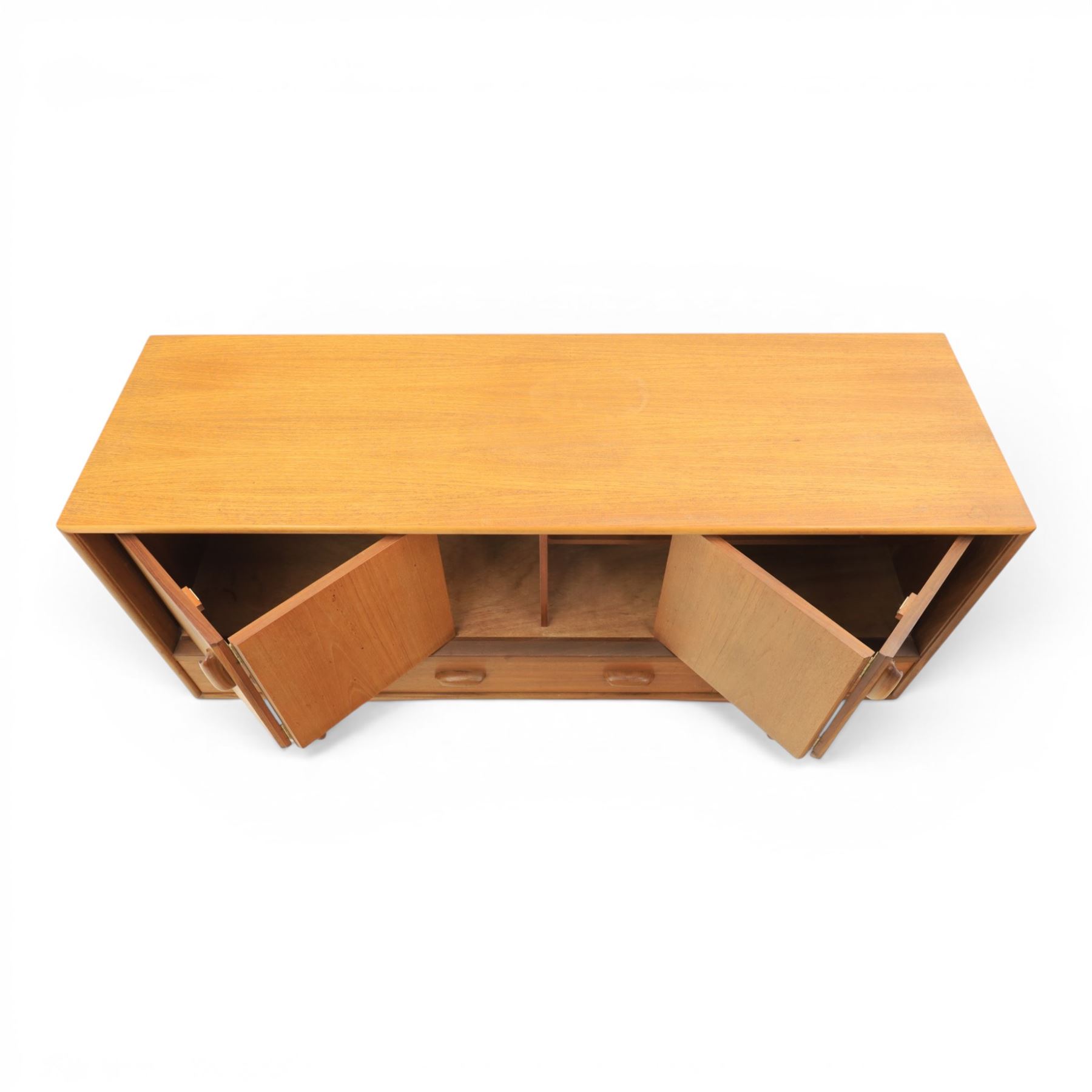 G-Plan - 'Brasilia' teak sideboard, with rectangular top above two concertina doors, above four drawers raised on cylindrical supports