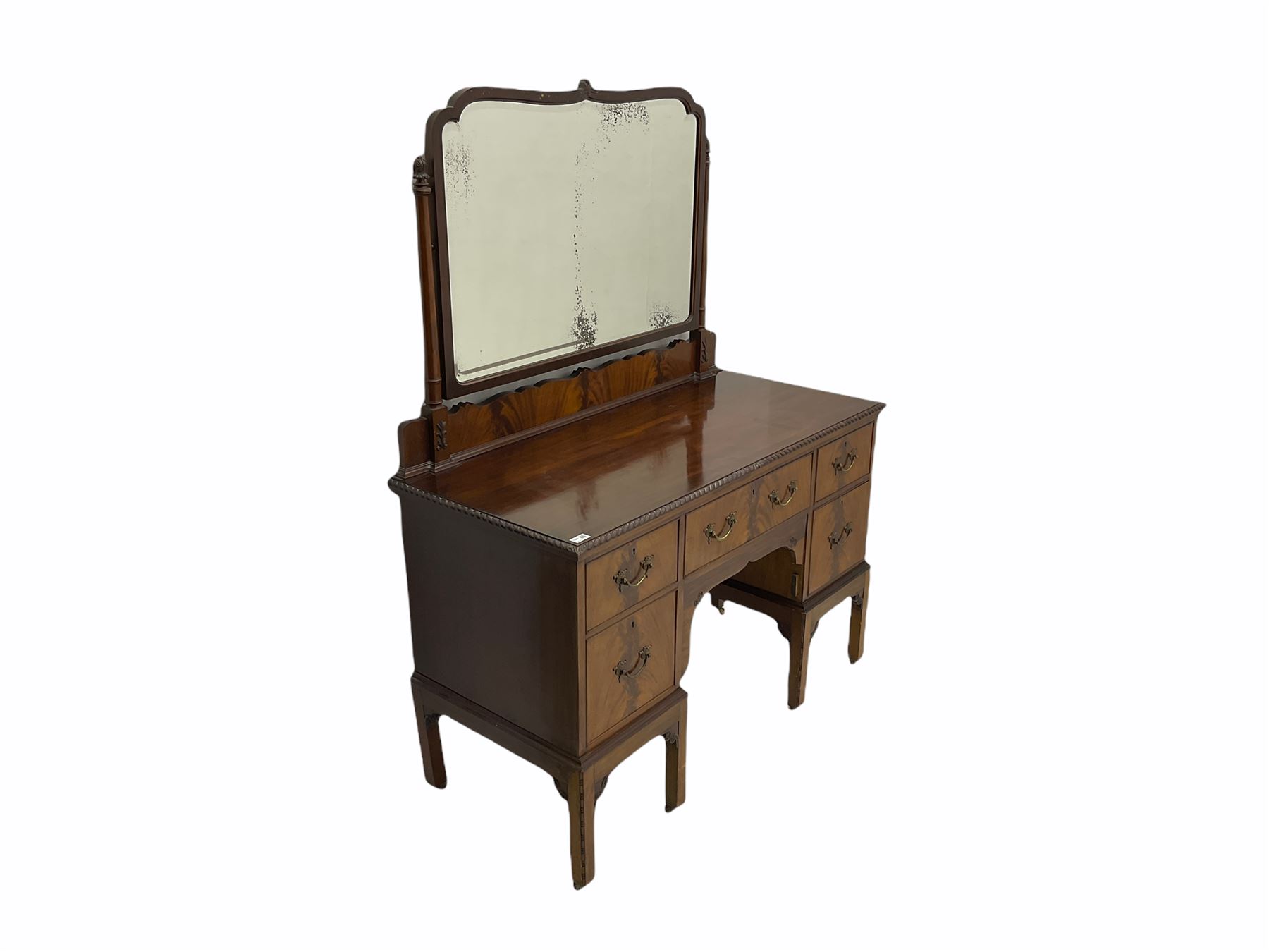 Early 20th century mahogany bedroom suite - dressing table (W122cm, H161cm, D56cm), chest (W107cm, H125cm, D51cm), and bedside cupboard (W44cm, H80cm, D44cm)