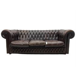Three-seat Chesterfield sofa, upholstered in buttoned brown leather 