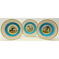  Set of three late Victorian Minton cabinet plates hand painted with Dog after Edwin Landseer, by Henry Mitchell, on turquoise ground within a pierced gilt basket weave border, all initialled 'HyM' and one having T. Goode & Co. retail stamp, c1879, pattern no. G739, D25cm (3) Provenance Property of Bob Heath, Brandesburton Formerly of Ravenfield Hall Farm near Rotherham  