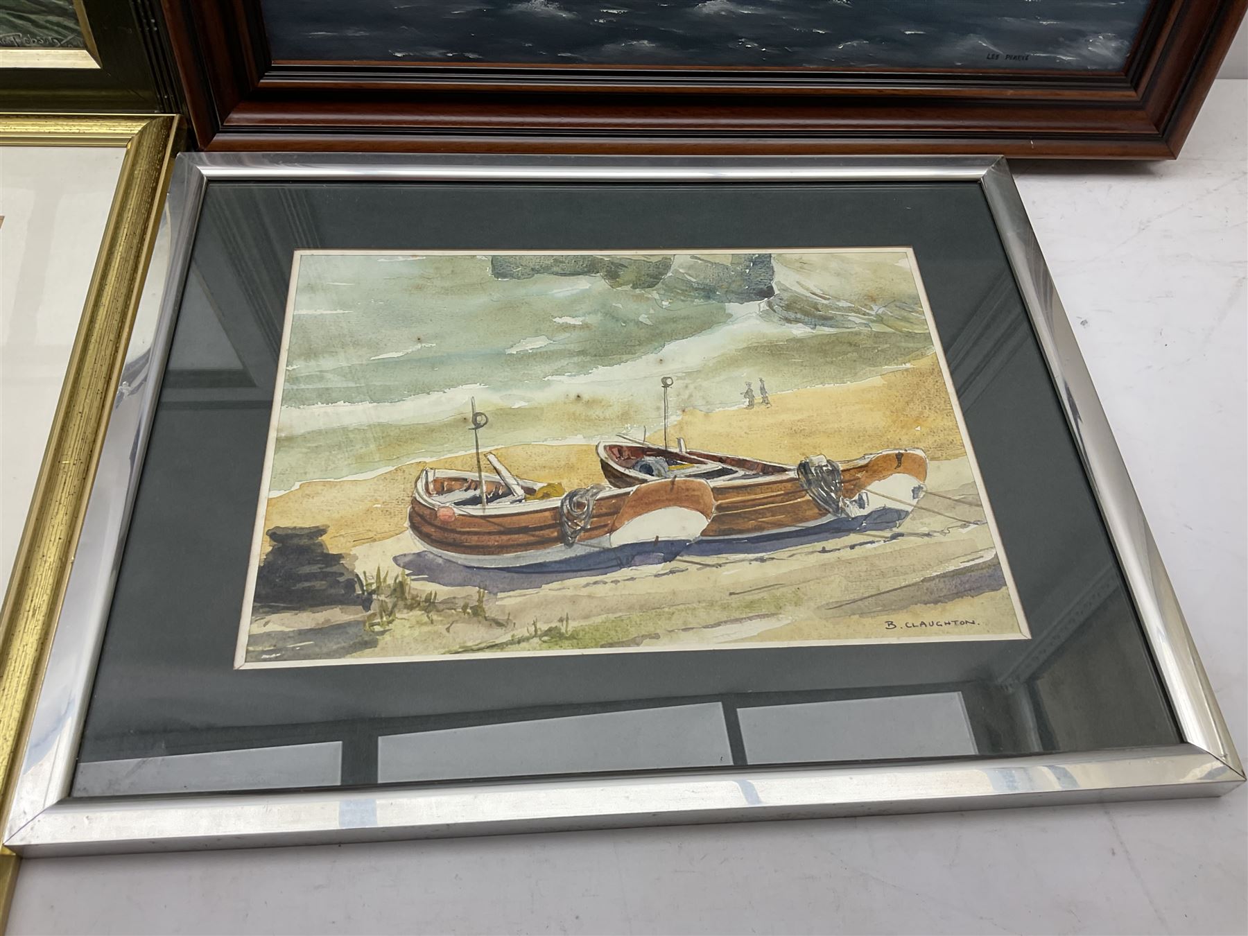 Barry Claughton (20th century): Cobbles at North Landing Flamborough, watercolour signed 23cm x 33cm; Landing the Catch, 19th/20th Century watercolour unsigned 28cm 39cm; Outward Bound, watercolour signed by S Barnes Robson 29cm x 37cm; Les Pearce (20th century): Thames Sailing Barge Race, oil on board signed  39cm x 49cm (4)