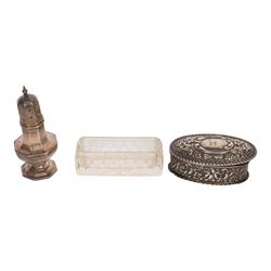 Collection of silver, including pair of silver mounted clothes brushes, cigarette case, mustard pot, pepper shaker, glass jar with silver lid and oval box