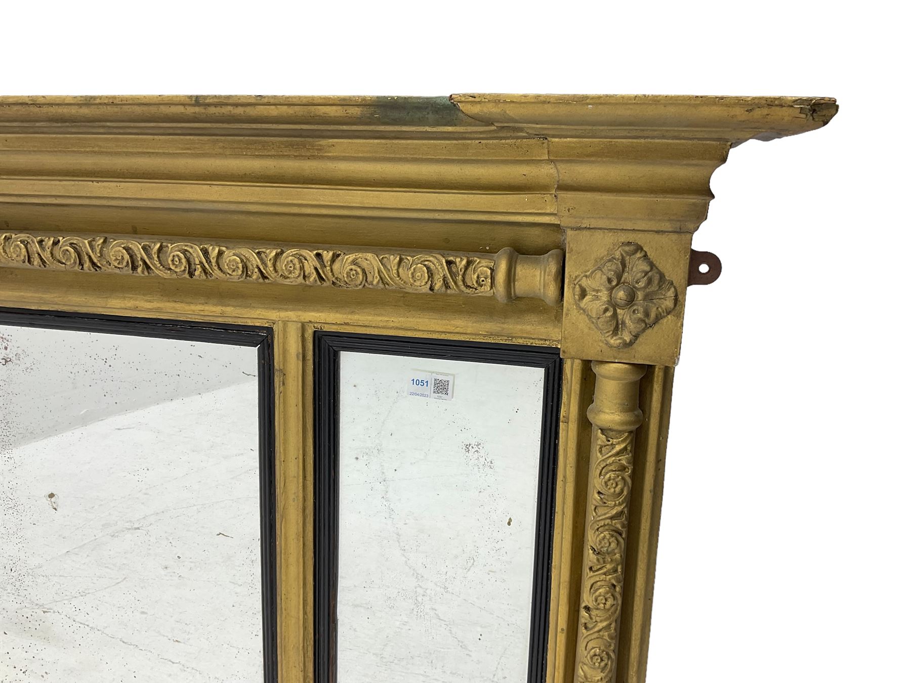 19th century gilt framed overmantel mirror with inverted breakfront cornice over three mirror panels framed by ornate columns