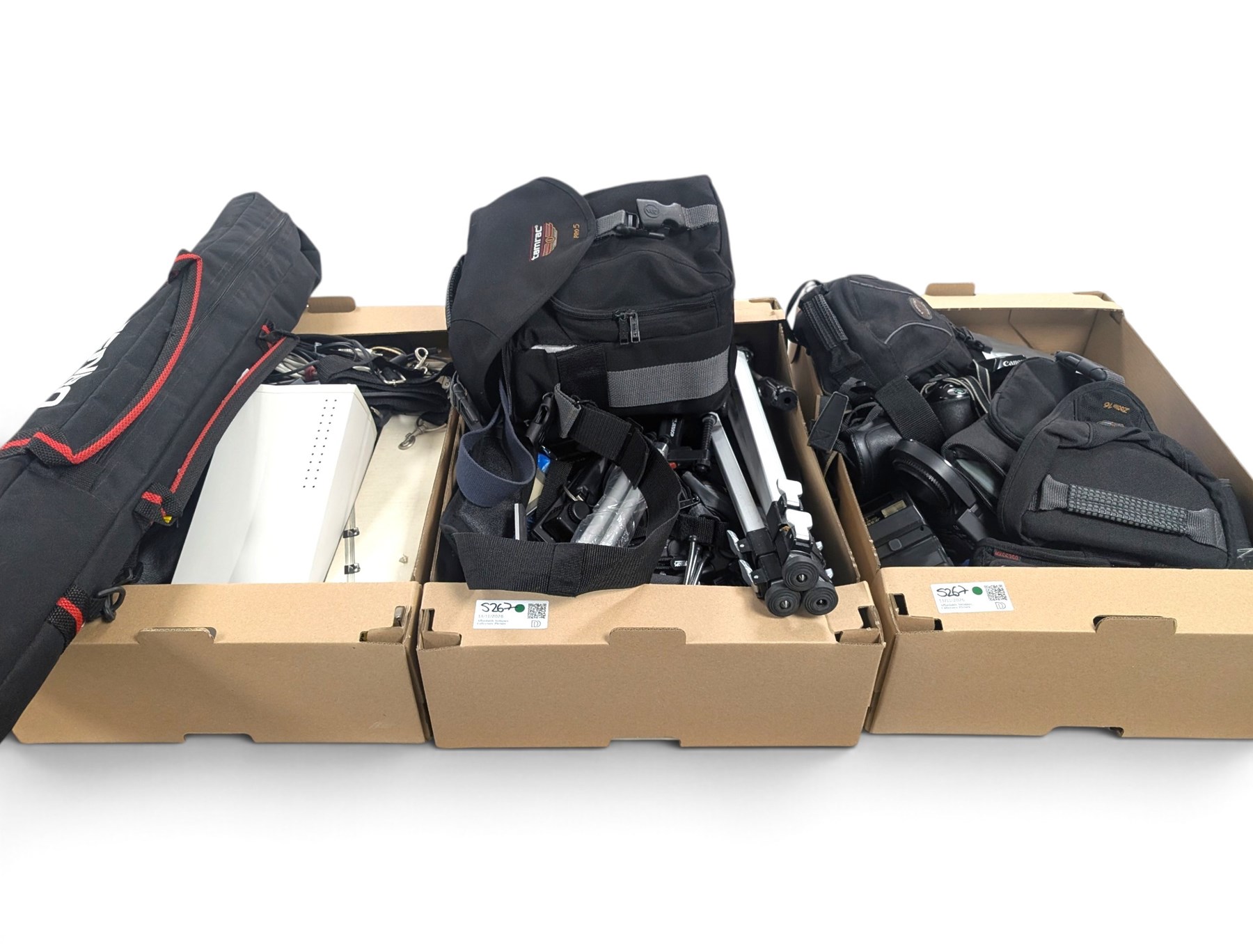 Collection of cameras and photography equipment, including Canon EOS 1000F DSLR, Fujifilm S9500, Canon EOS 10, lenses, filters, tripods, etc, in three boxes