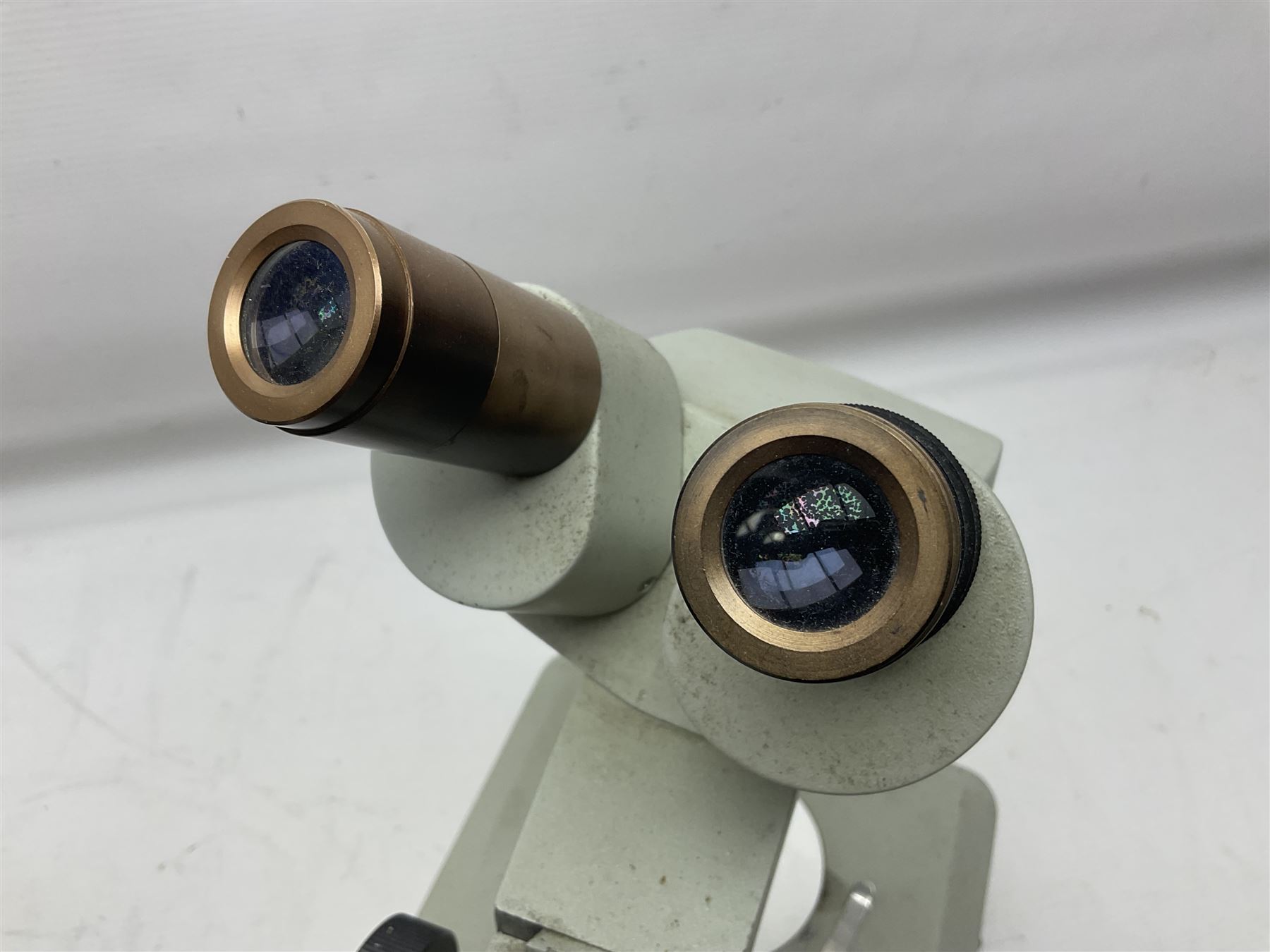 Three Binocular microscopes, comprising two W. Watson & Sons Bactil no 110331 and 107773 and Tasco LMSQF-F