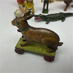 Painted lead animals, including a lion, camel and kangaroo, other toy figures and a vintage teddy bear
