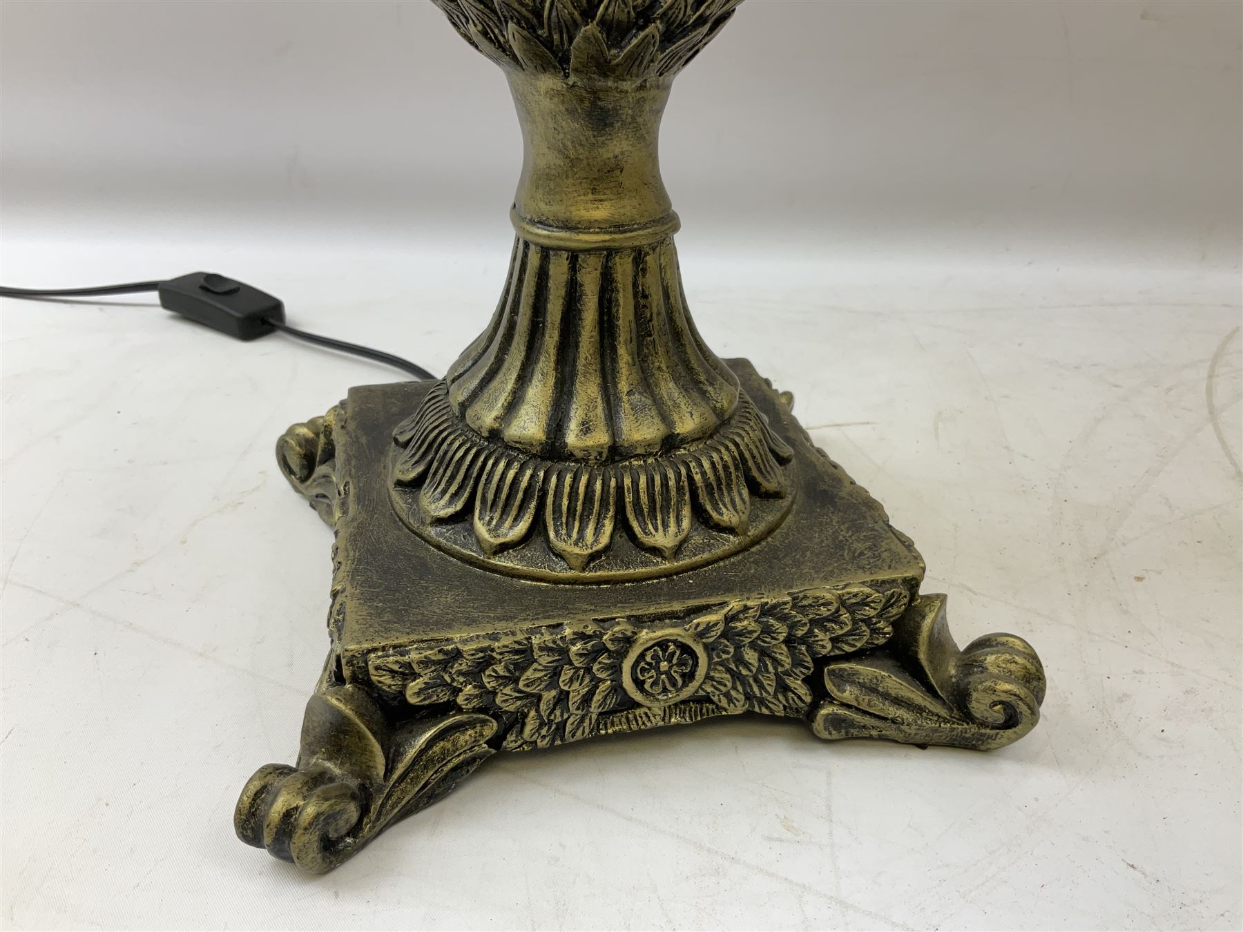 Pair bronzed amphora lamps with pineapple decoration, scroll handles and foliate base with scrolled feet together with pair peach ground shades and raised floral pattern H76cm (2)