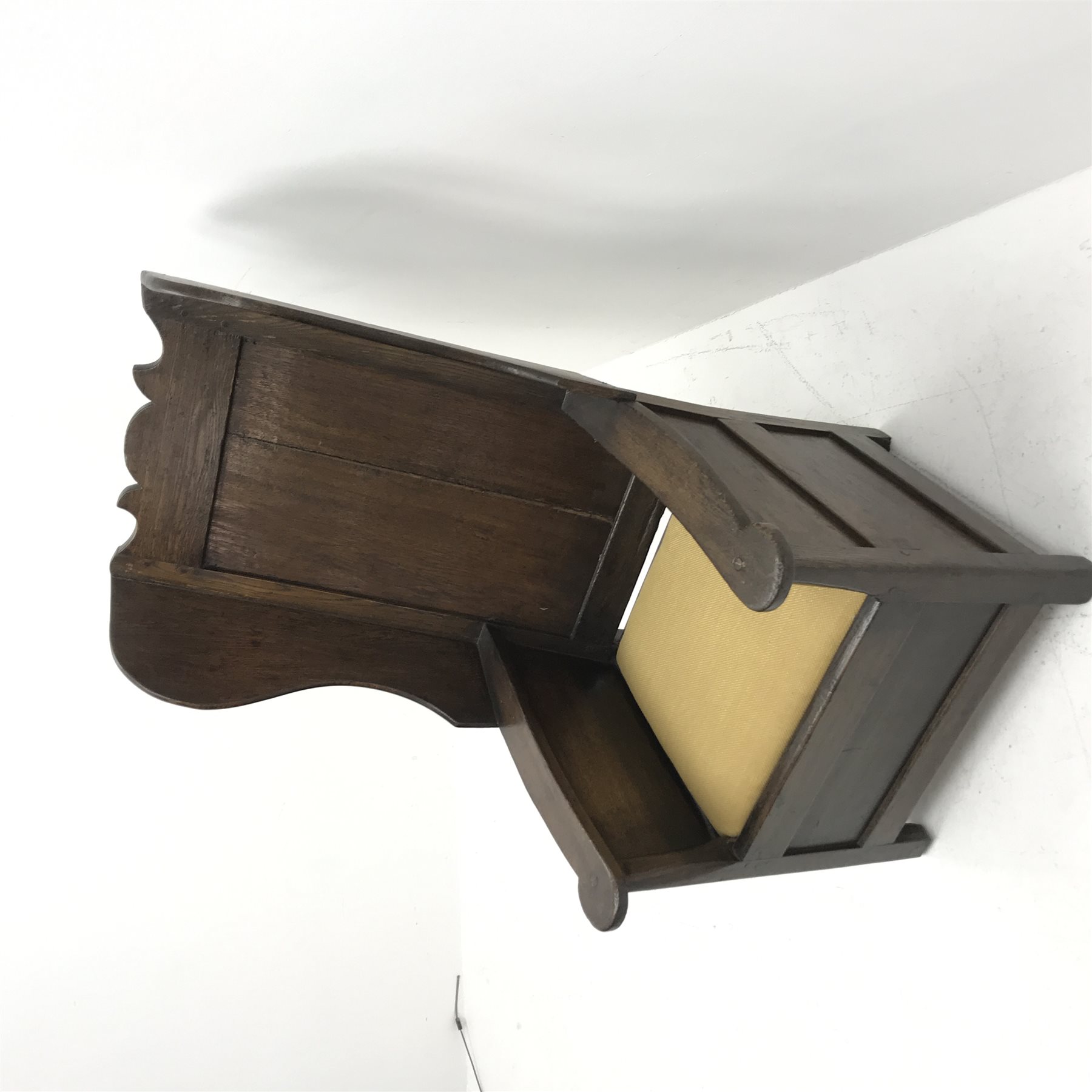 18th century Yorkshire Dales oak lambing chair, shaped cresting rail above panelled wing back, panelled sides and front, drop in upholstered seat cushion, W65cm, H111cm, D80cm