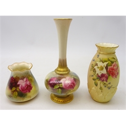  Three early 20th century Royal Worcester vases a mallet shaped with slender trumpet neck & smaller vase, both hand painted with roses, c1912 and a blush ivory vase c1914, H14cm (3)   
