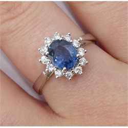 18ct white gold sapphire and diamond cluster ring, hallmarked, sapphire approx 1.20 carat