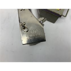 Bell Punch Company of London 'The Ultimate' five lever fare collection machine, together with an Almex ticket machine with shoulder strap, two brass Halifax transport cap badges, other chrome tramway cap badges, etc