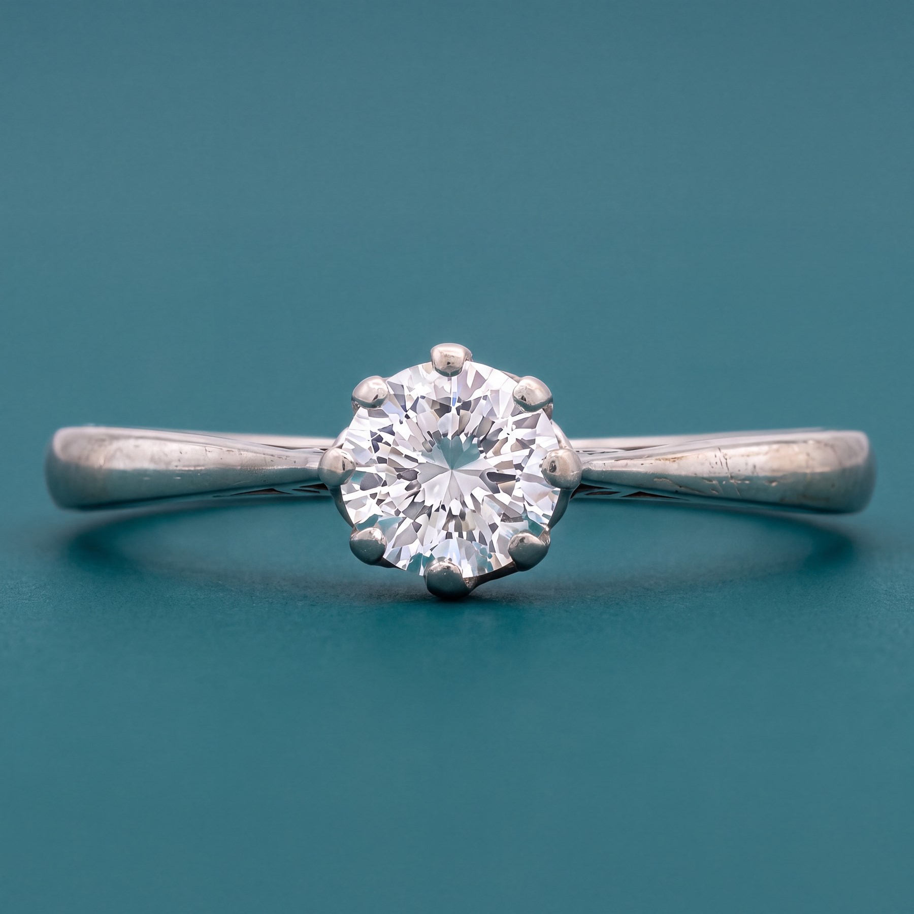 White gold diamond ring, eight claw set with a single round brilliant cut diamond of approx 0.50 carat, stamped 18ct
