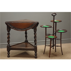  Late 19th century oak corner drop leaf table, foliate carved banding, barley twist supports joined by an undertier, (W57cm, H72cm) and a mahogany four tier cake stand, carrying handle, turned column, square tapering sabre supports, (W54cm, H90cm, D43cm)  
