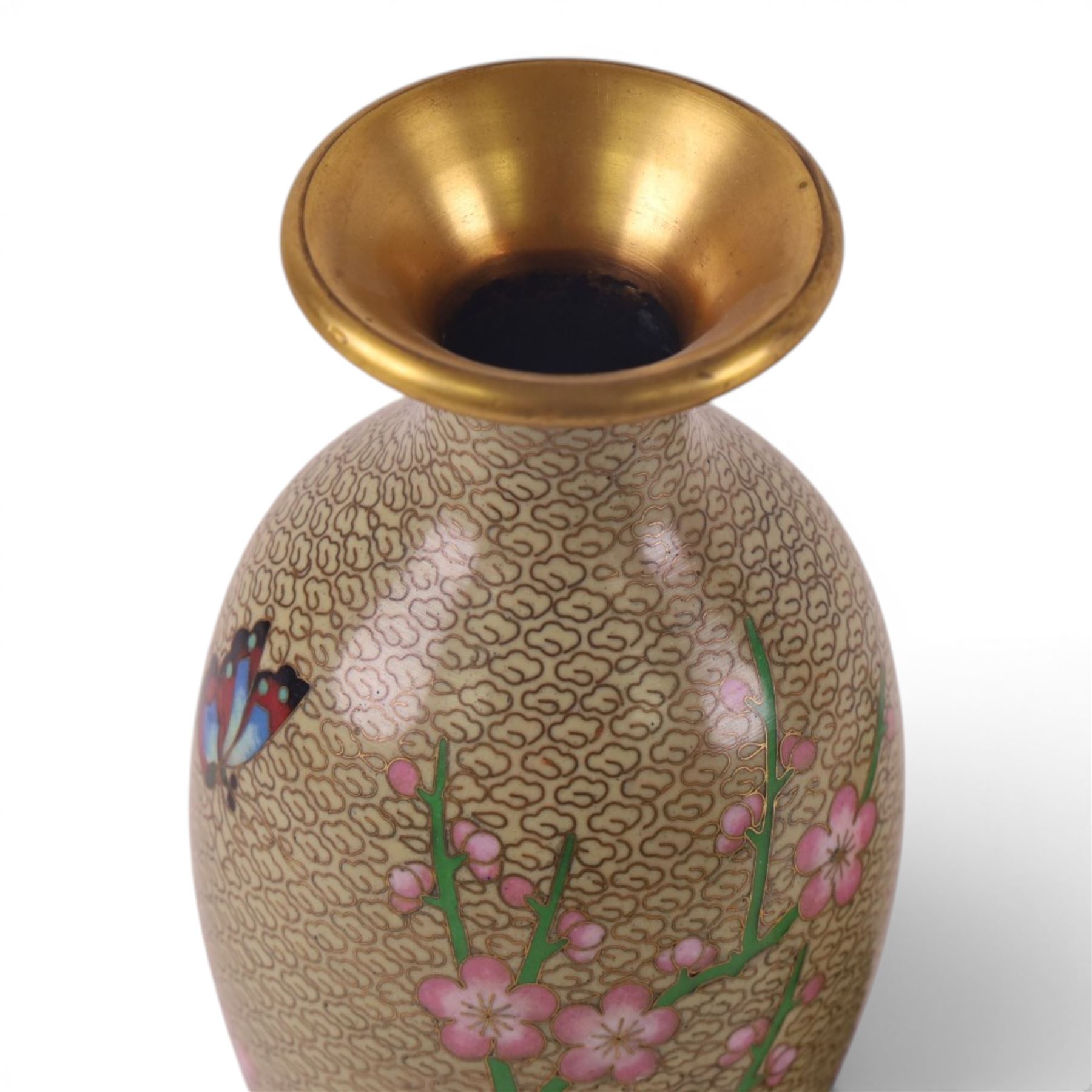 Pair of Cloisonné vases decorated with cherry blossom and peonies, upon a carved hardstone wooden base, H24cm 