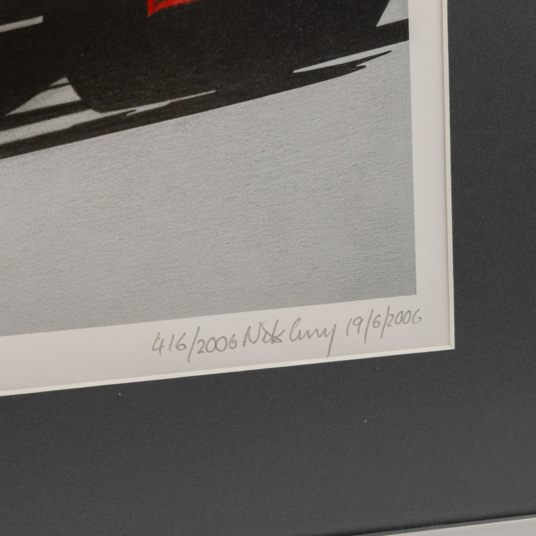 Four Formula 1 racing prints by Nik Curry, including a signed limited edition example, all within silver frames, H38cm, W59cm