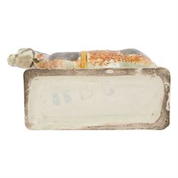 Late 18th/early 19th century Prattware pottery figure of a horse, possibly Yorkshire Potteries, circa 1790-1800, painted and sponge decorated in manganese, with blue spotted saddle secured with a yellow girth, upon a rectangular green base, H15.5cm