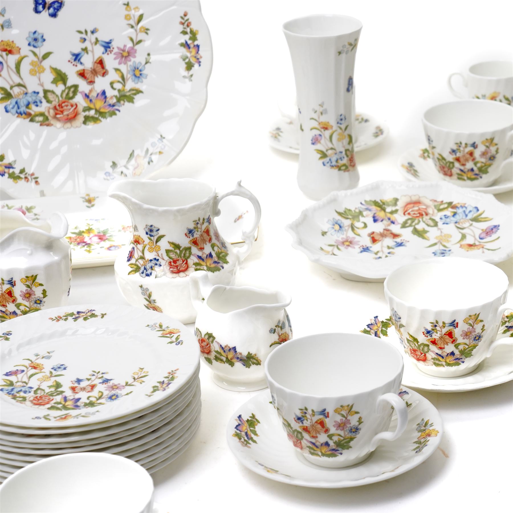 Aynsley Cottage Garden tea set comprising thirteen cups and saucers, eleven plates, bread and butter plate and milk jug, together with six coffee cans and saucers, cream jug and sugar bowl and four other Cottage Garden pieces
