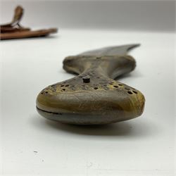 Late 19th century Yemeni Tuza jambiya as worn by religious elite, the 20.5cm curving blade with raised medial ridge, the horn hilt with pique style studwork, in a leather wrapped wooden scabbard with pierced metal mount and leather belt applied with embroidered 'gold' and 'silver' thread work panel; dagger L36cm overall, belt L84cm