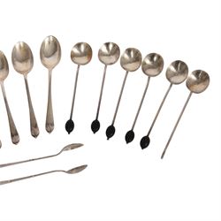 Collection of silver cutlery, including sugar tongs, coffee bean spoons, teaspoons, etc, all hallmarked