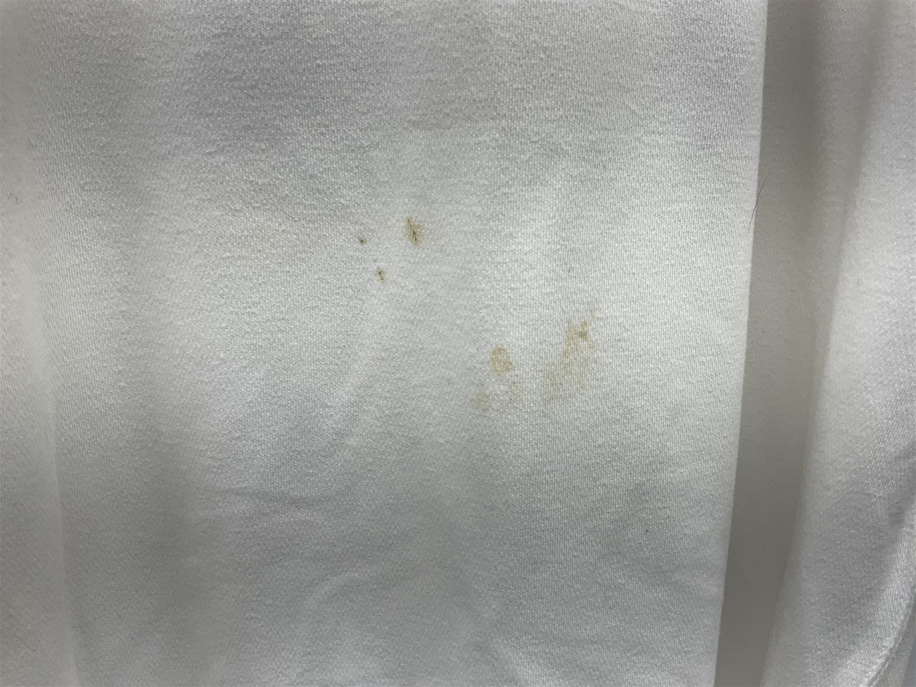 Fourteen items of replica sporting clothing including Leeds United football club shirts, England jerseys etc