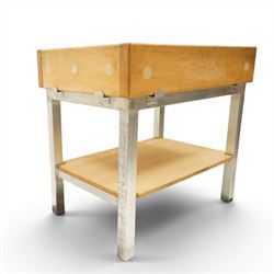 20th century butchers block kitchen island, solid top raised on stainless steel supports united by and undertier