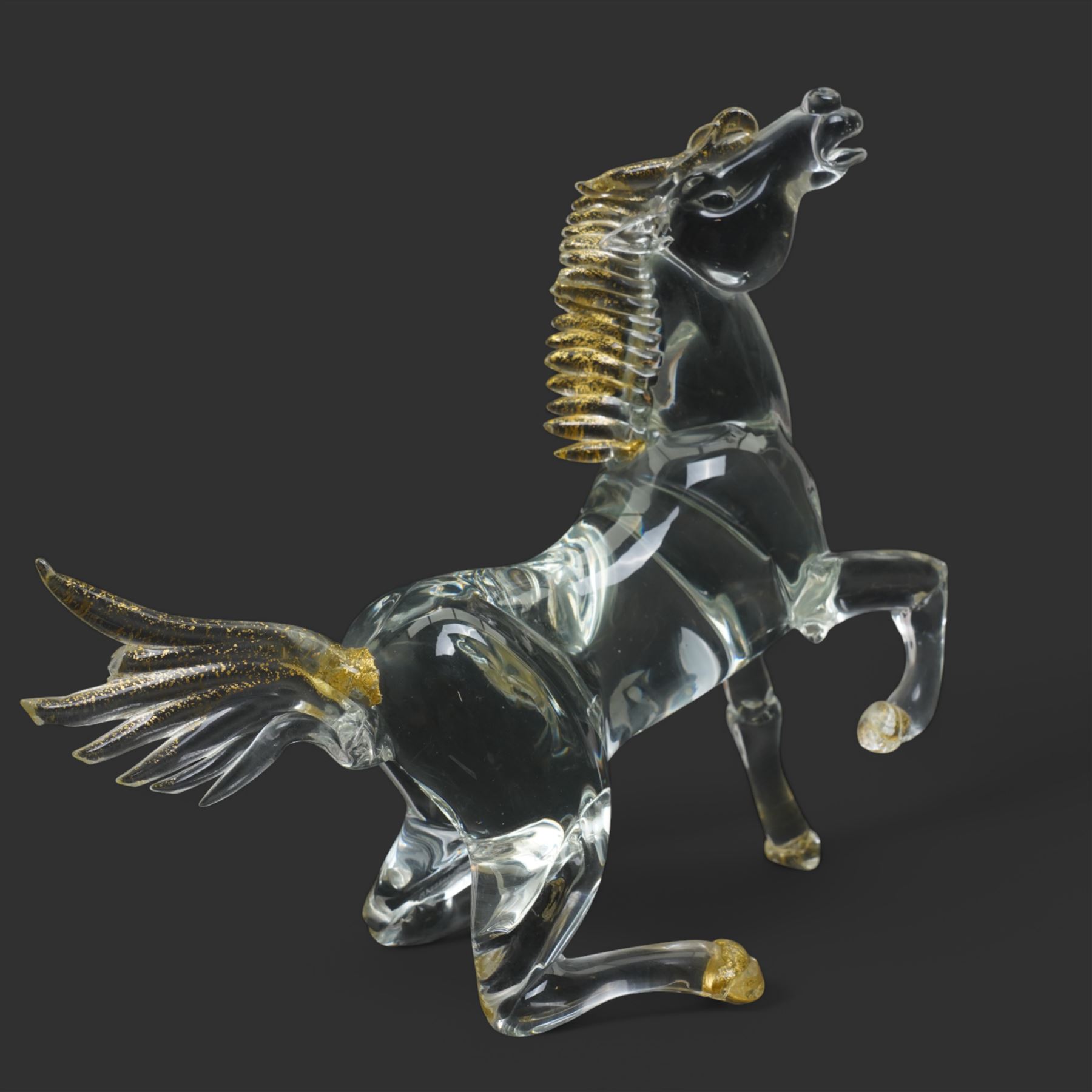 After Oscar Zanetti - Two Murano glass rearing horses with aventurine details to mane tail and hooves, larger 35cm and a Murano dolphin H24cm (3)
