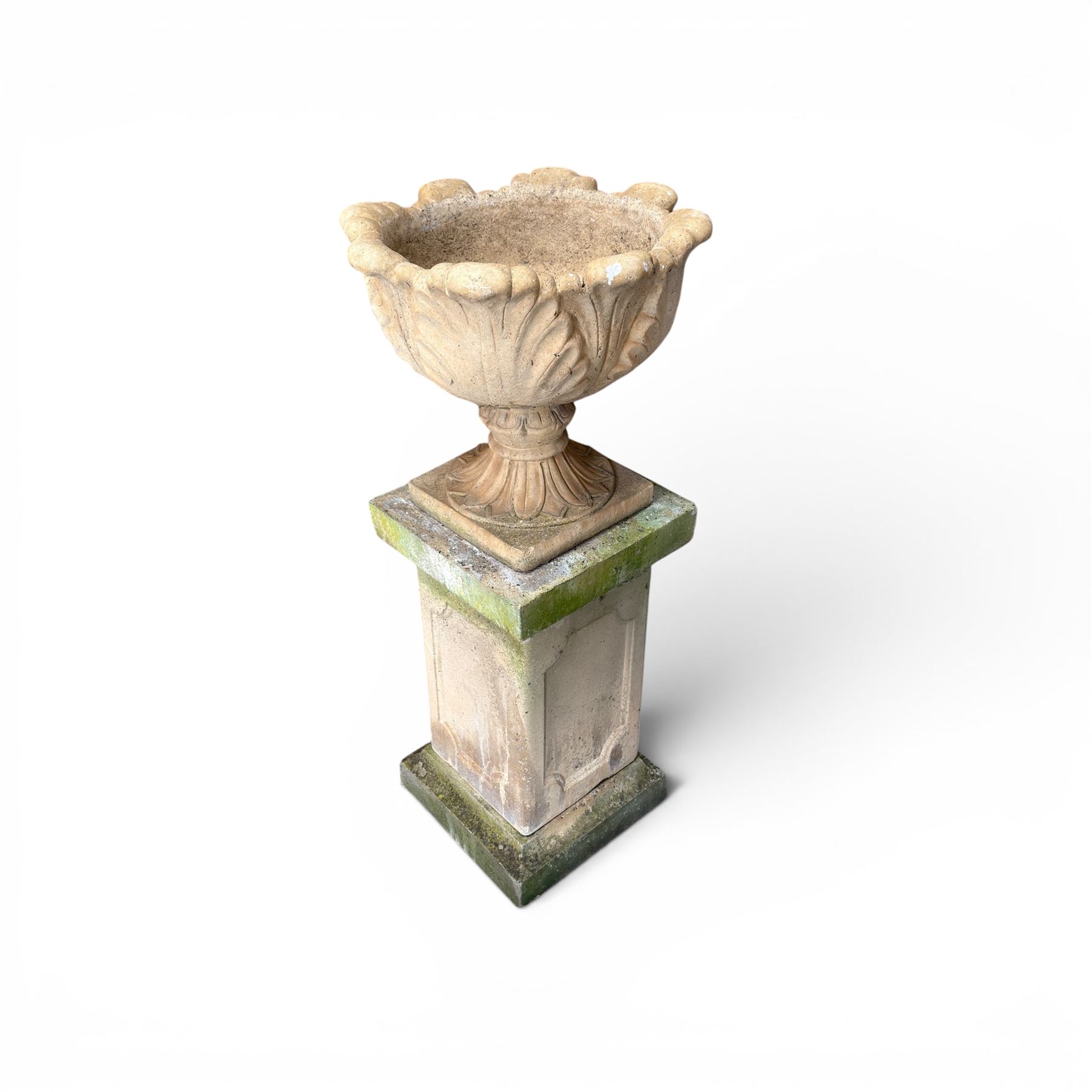 Cast stone five sectional urn on plinth, squat leaf and petal design urn on square base