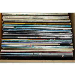 Large collection of records including Genesis, Fleetwood Mac, Dire Straits, U2 etc