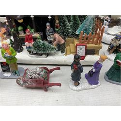 Christmas decorations; Premier LED Christmas Village scene with moving train, together with three Lumineo christmas scenes, and other similar 