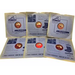 HMV portable wind up gramophone in a black case, together with a collection of records. 