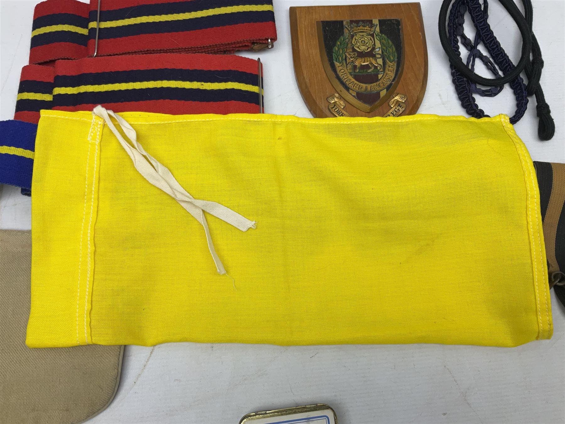 Miscellaneous militaria including two Royal Artillery and one Royal Horse Artillery stable belts; Northamptonshire Regiment trench art brass shell case lighter; unused Matchless Fire-Set; pocket knives and multi-tool; lanyards; oak shield with York & Lancaster crest etc