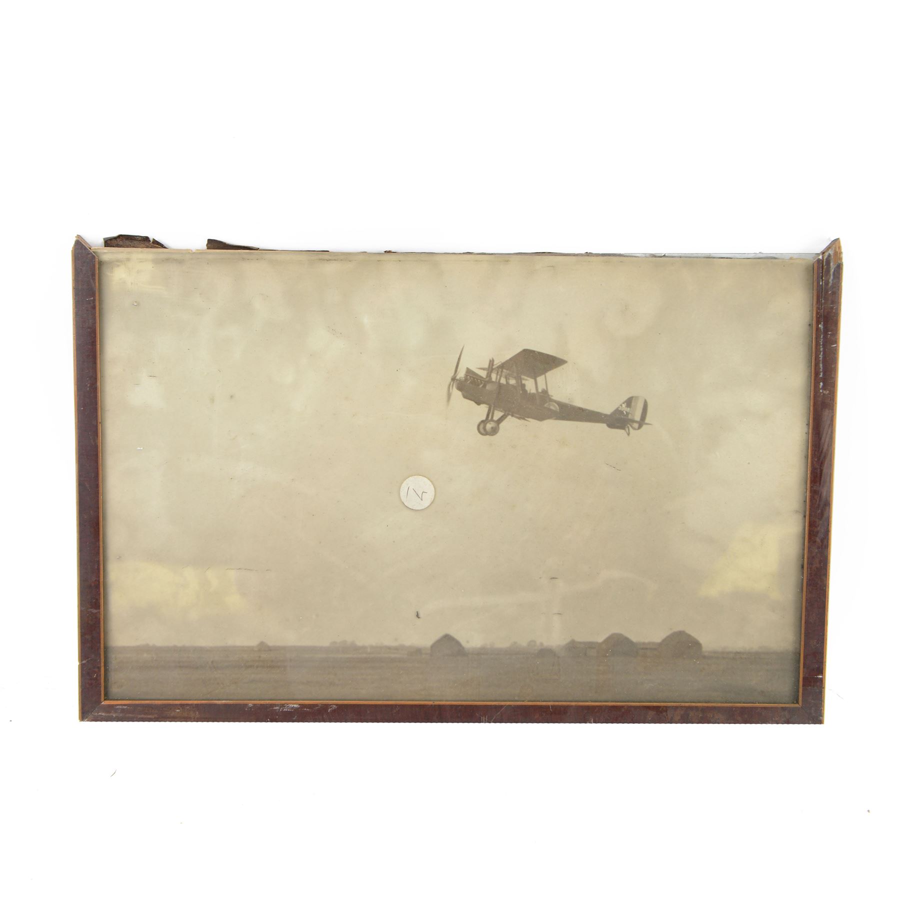 Collection of five original photographs relating to the Royal Flying Corps, including Early Aerial photograph of Hasting 1917, an aeroplane in flight etc 