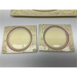 Clarice Cliff Biarritz part dinner set, circa 1930, for Royal Staffordshire, of rectangular form, decorated with bluebells, to include one serving plate, six dinner plates, three side plates, etc, printed mark beneath with reg no 784849 (17)