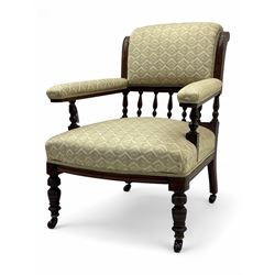 Late Victorian mahogany framed armchair, scroll back with spindle gallery, upholstered sea...