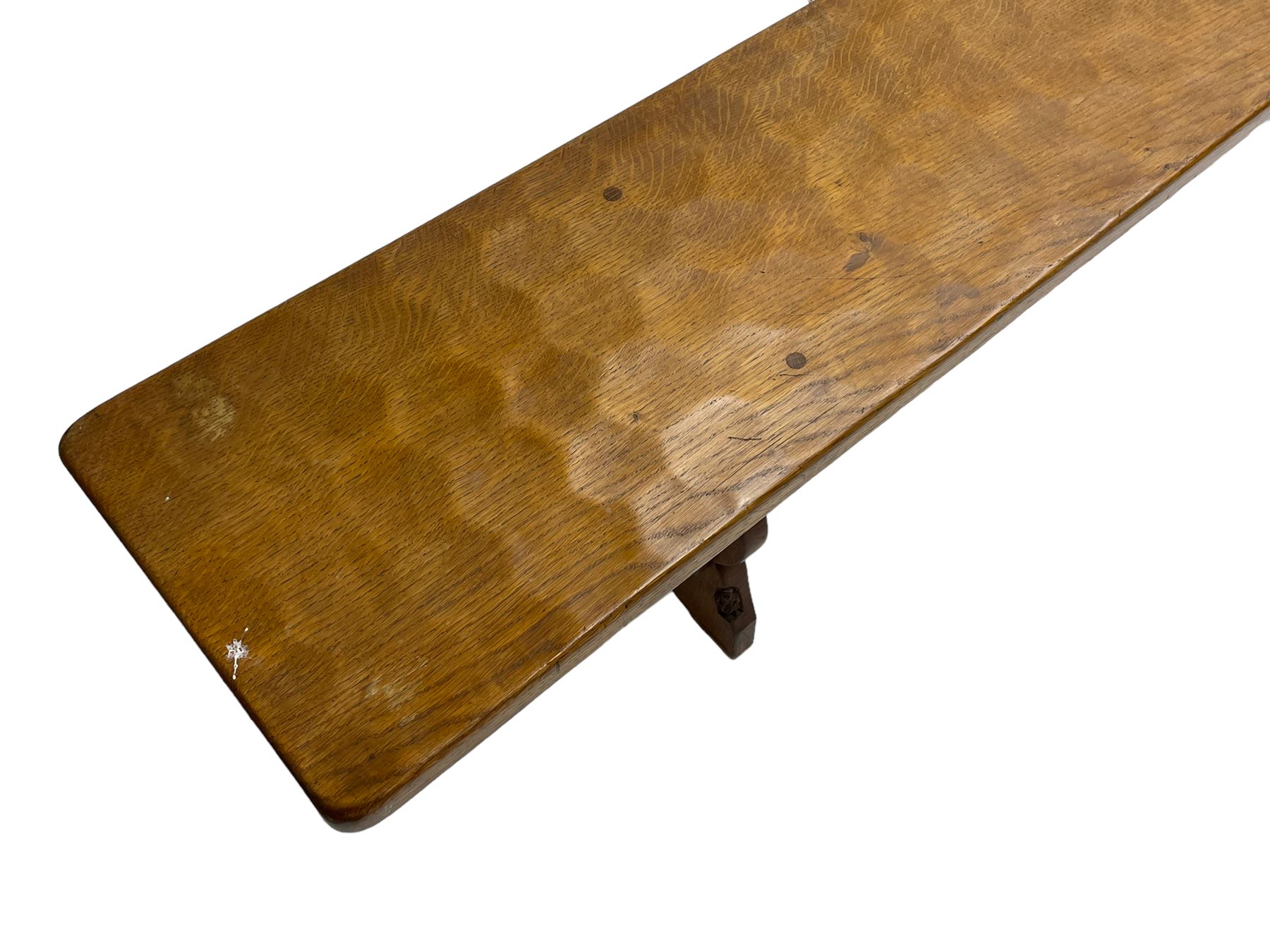 Gnomeman - adzed oak narrow bench, rectangular seat on shaped end supports united by pegged stretcher, carved with gnome signature, by Thomas Whittaker, Little Beck 