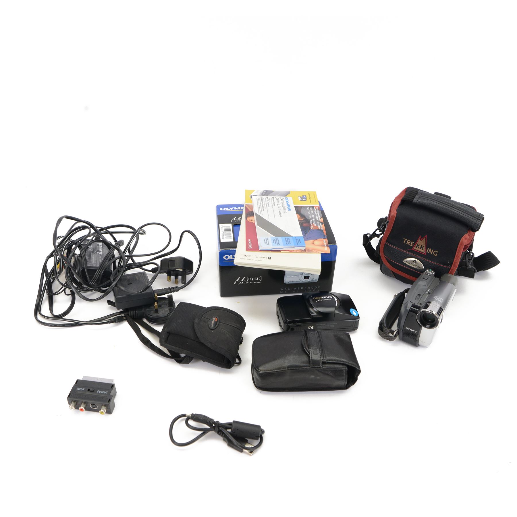Olympus MJU Zoom 115 all weather compact camera serial no. 5555309, in soft shell case with instructions, together with an Olympus MJU 740 all weather digital camera serial no. C53508094, boxed with instructions and a Sony Handycam DCR HC24 serial no. 1251456, in soft case with instructions 