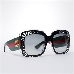 Gucci - pair of oversized black acetate sunglasses, the square frames with studded and cry...